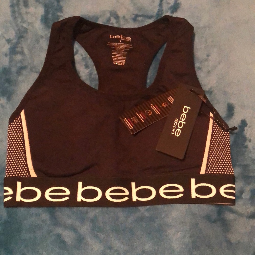 NWT Bebe sports bra size small with removable pads .